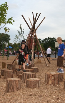 Nature playground and outdoor classroom at the William Hammerschmidt School Learn + Play Gardens, a WRD Environmental project