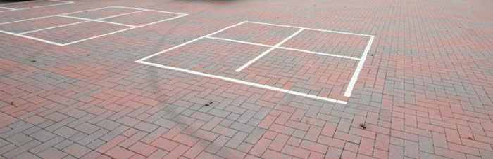 Permeable paving at Edgewood Elementary School that doubles as a four-square court for students