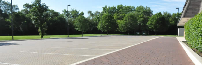 A parking lot and walkway featuring water-conserving permeable paving at Willow Creek Elementary School, a WRD Environmental project